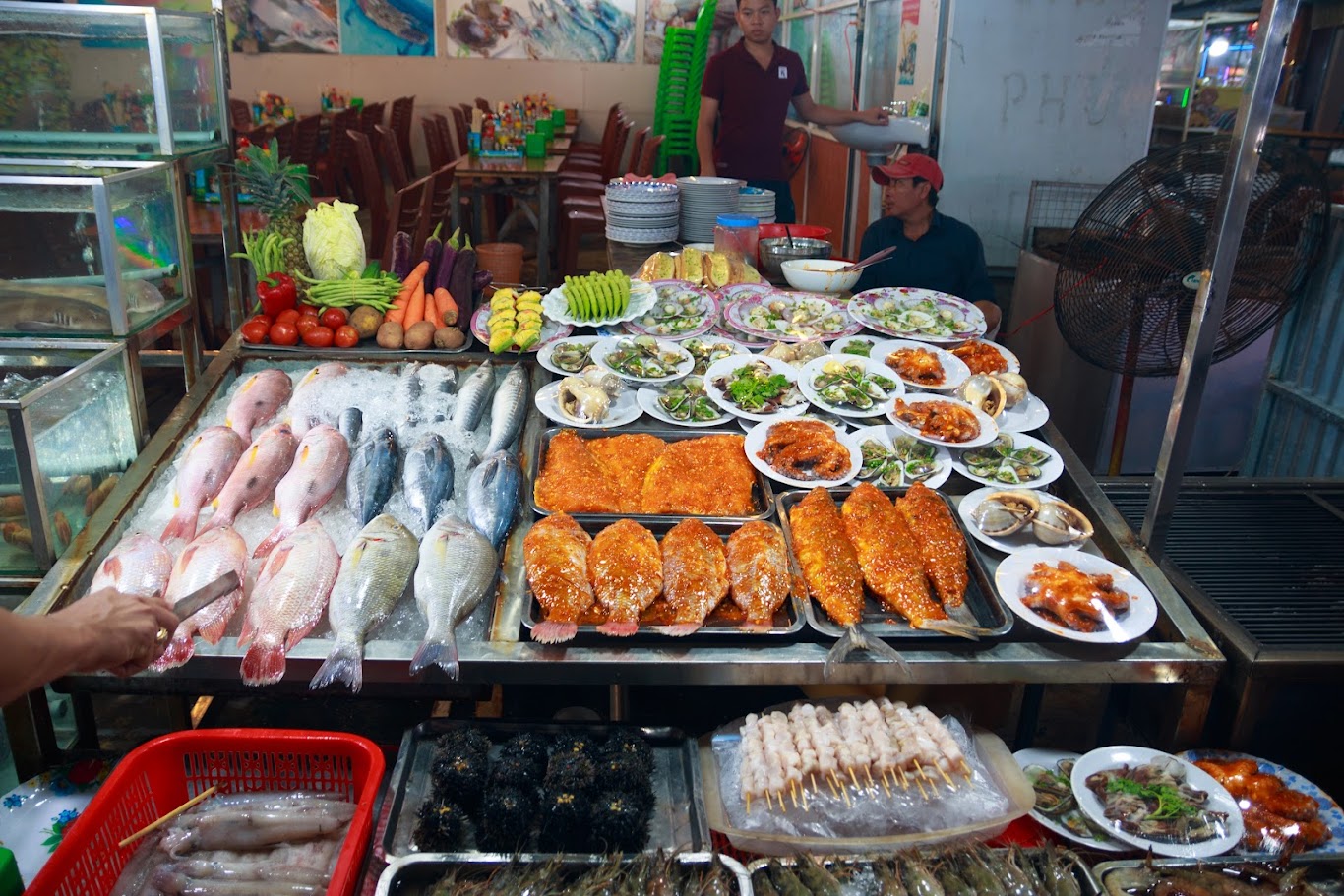 Phu Quoc Seafood: Grilled Sea Urchin with Scallion Oil, Herring Salad, Ham Ninh Crab