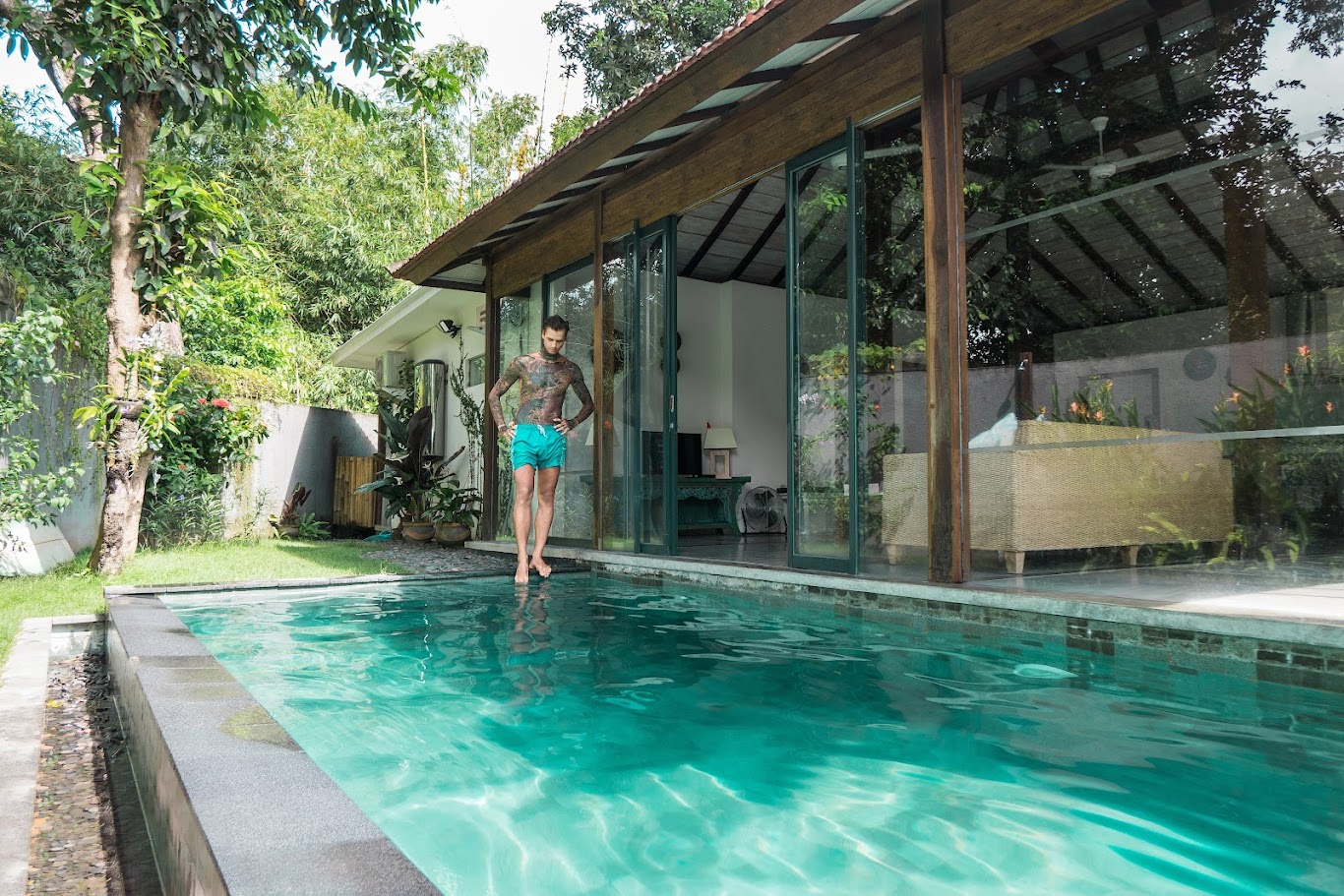 A jungle-surrounded swimming pool at a Bali resort.