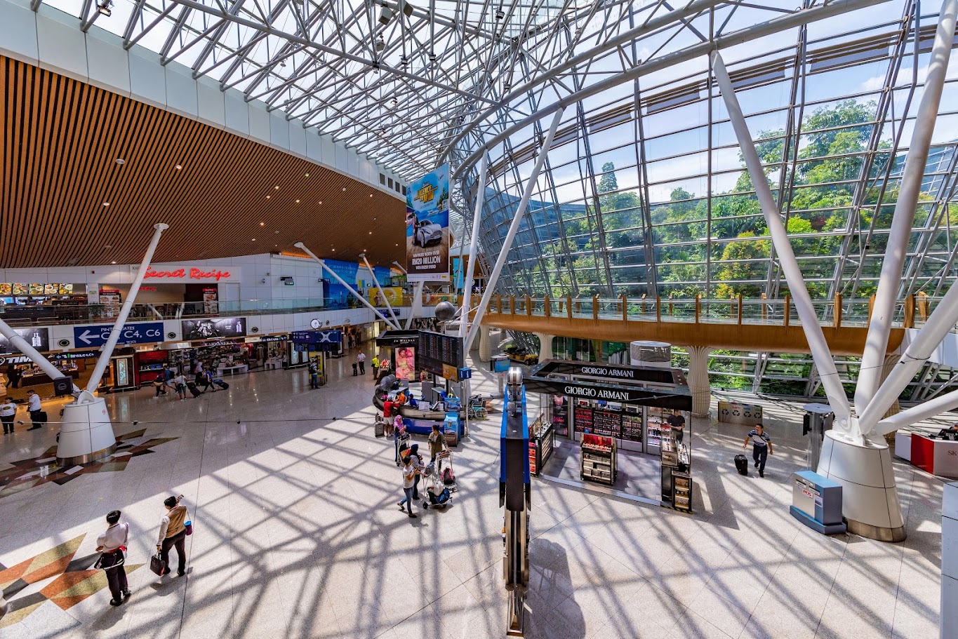 Should you choose a hotel in downtown Kuala Lumpur or near the airport?