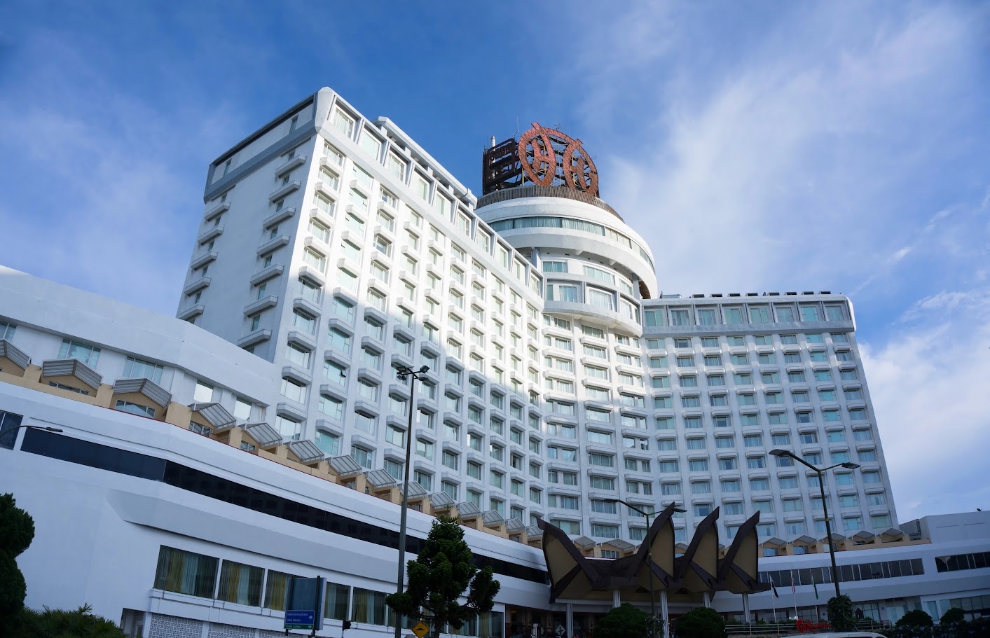Should you choose a hotel in downtown Kuala Lumpur or near the airport?
