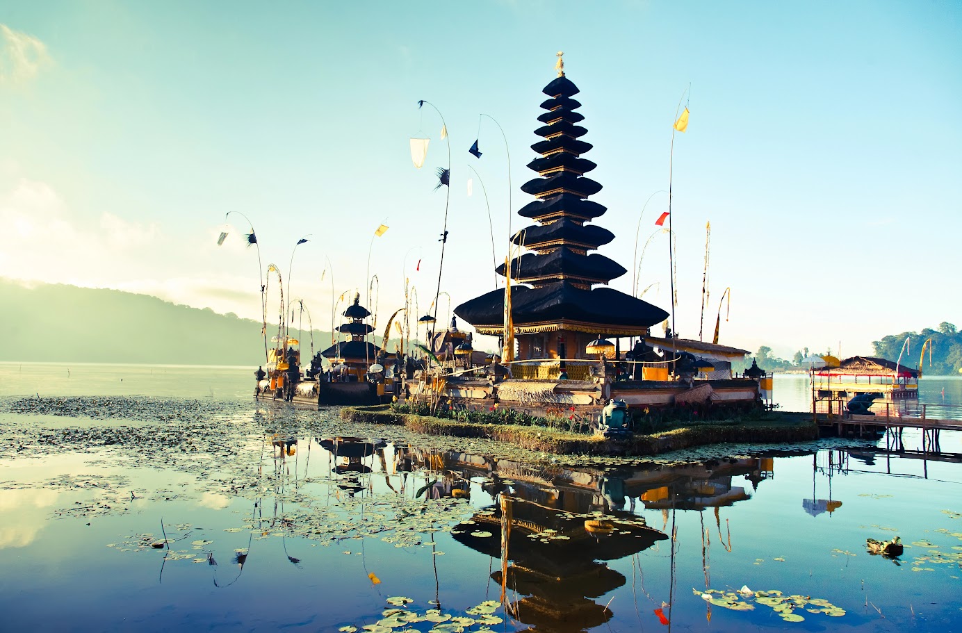 Pura Ulun Danu Bratan Temple reflecting on a tranquil lake.